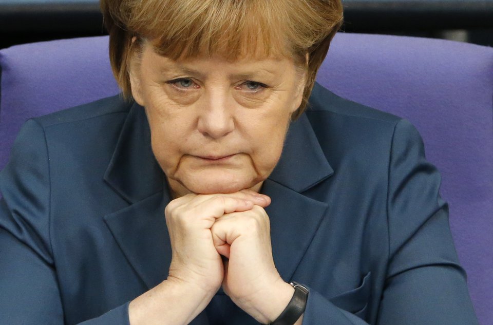 Меркель: Работа над реализацией пакета минских соглашений проходит сложно