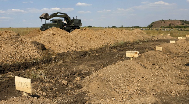 ПАСЕ: На Донбассе много погибших похоронены в братских могилах