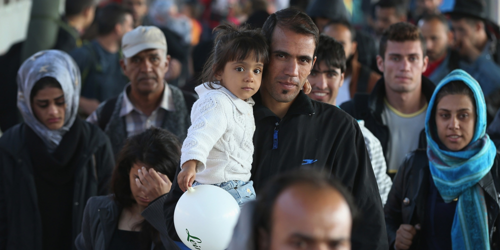 Германия завершает прием беженцев по миграционной программе ЕС