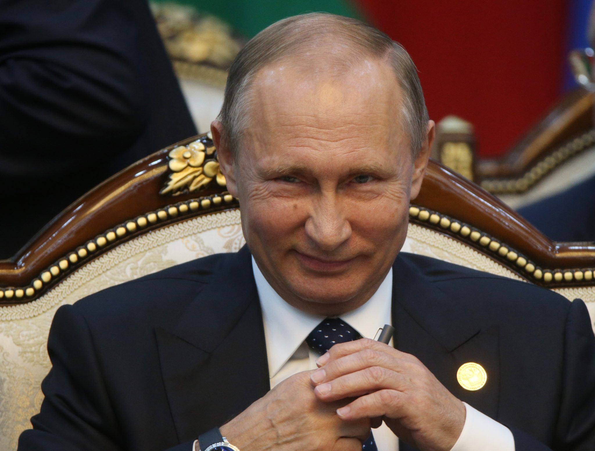 Путин согласился начать снятие санкций с Украины