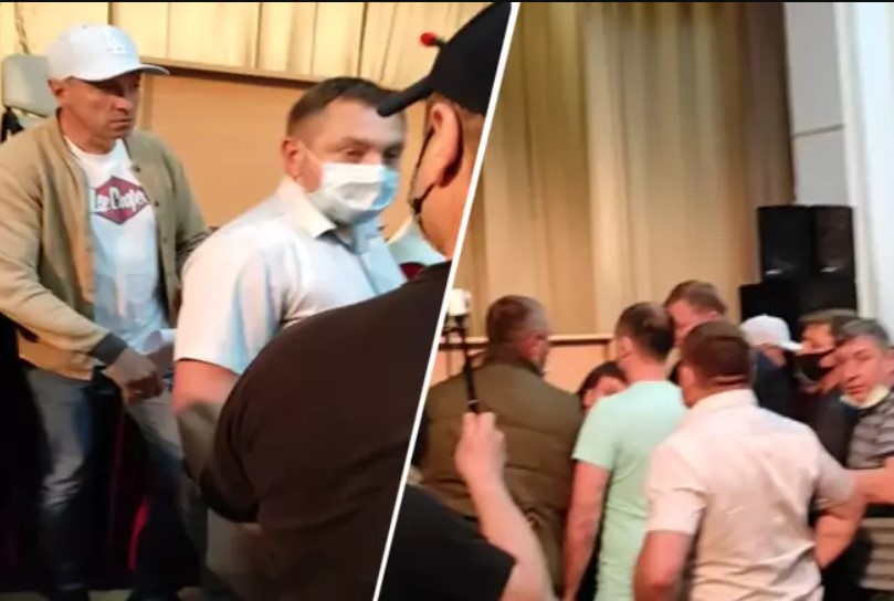 Под Киевом депутат ударил коллегу по голове за съемку конфликта (видео)